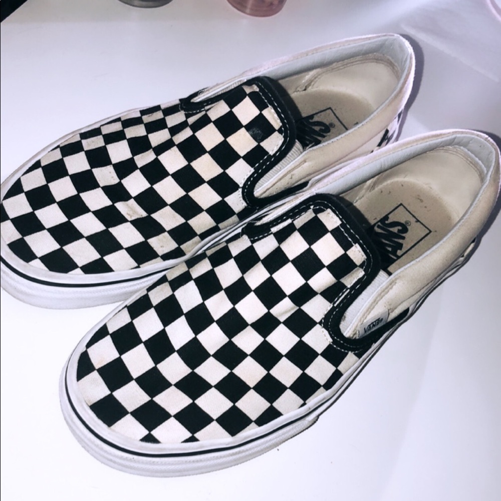 Black and white chekar board vans slip on